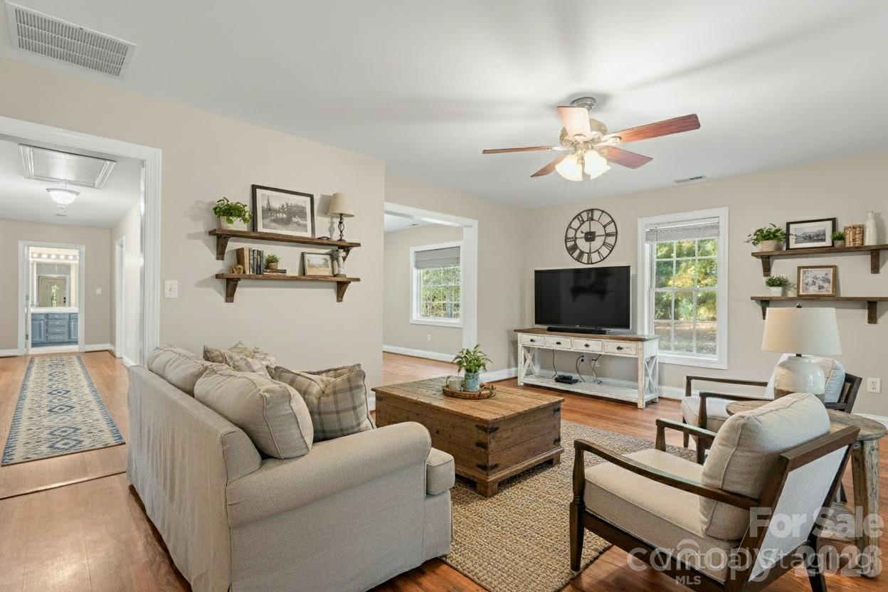 8450 Red Road Rockwell, NC 28138 - Photo 10 of 48 a living room with furniture flat screen tv and a window