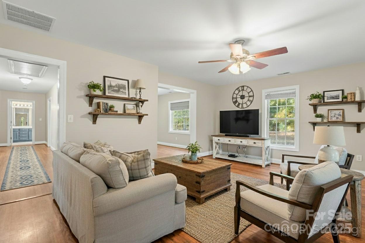 8450 Red Road Rockwell, NC 28138 - Photo 10 of 48 a living room with furniture flat screen tv and a window