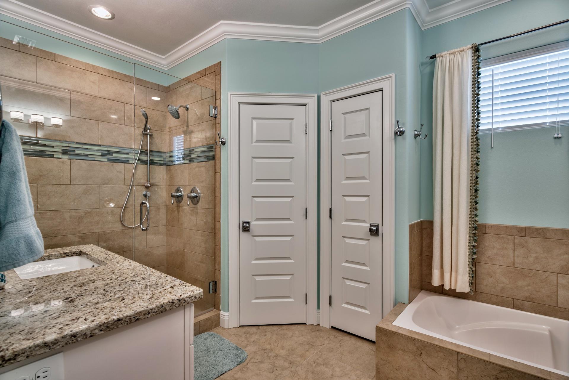 1976 Baytowne Loop Miramar Beach, FL 32550 - Photo 15 of 23 a bathroom with a granite countertop sink mirror and shower