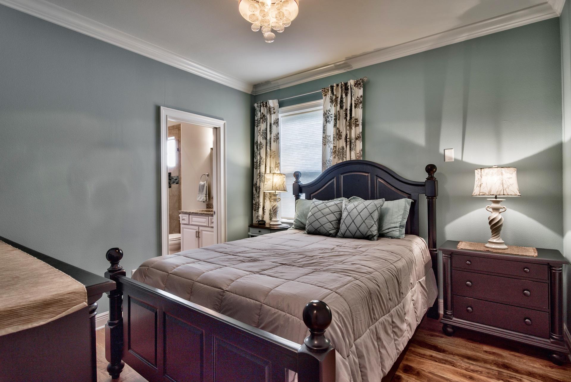 1976 Baytowne Loop Miramar Beach, FL 32550 - Photo 17 of 23 a bedroom with a bed and a window