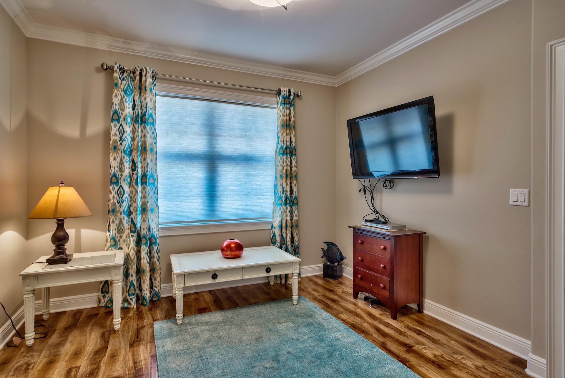 1976 Baytowne Loop Miramar Beach, FL 32550 - Photo 19 of 23 a living room with furniture and a flat screen tv
