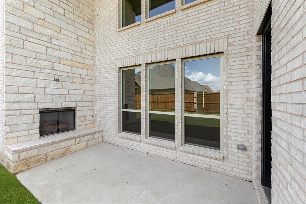 1724 Ruby Way Rockwall, TX 75087 - Photo 27 of 29 a front view of a house with a garage