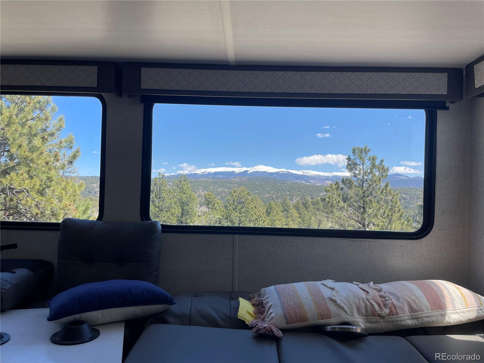 0 Twinkle Road Guffey, CO 80820 - Photo 20 of 24 a living room with furniture and a large window