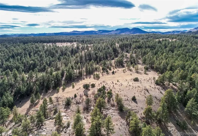 a view of mountain view with mountains in the background