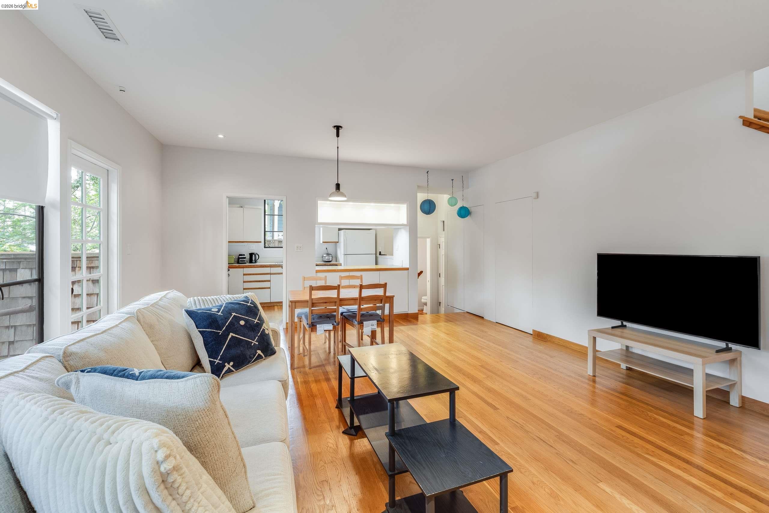 2316 Blake Street, Unit A Berkeley, CA 94704 - Photo 8 of 30 Living area featuring light wood-style flooring