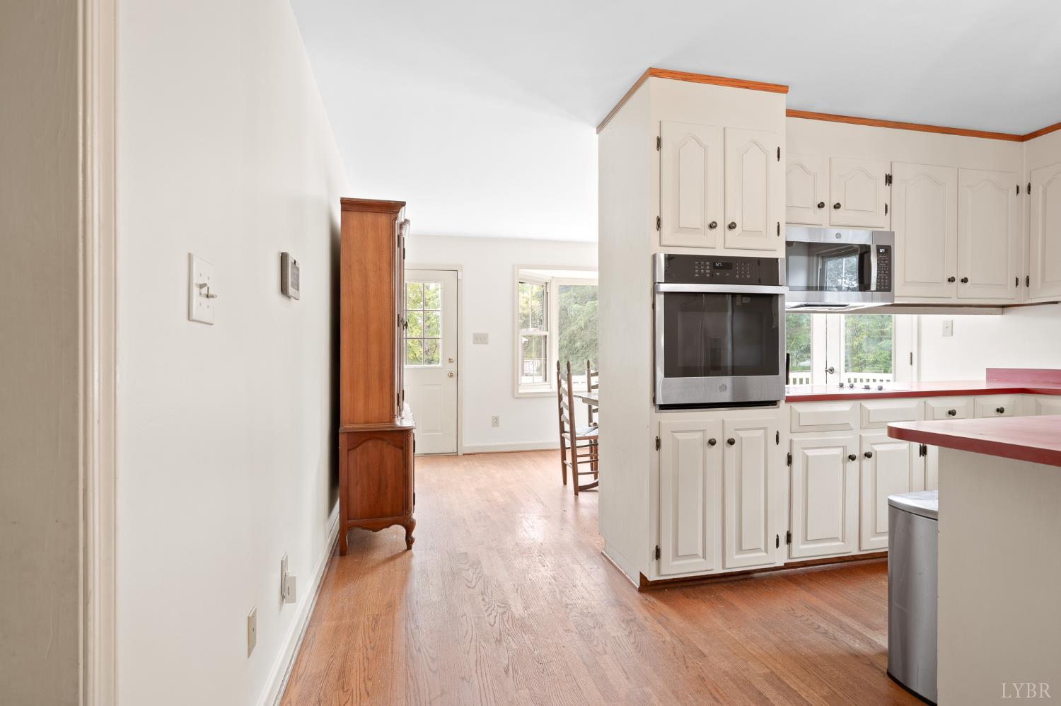 111 East Otter Ridge Drive Goode, VA 24556 - Photo 22 of 62 a kitchen with stainless steel appliances a refrigerator sink and cabinets