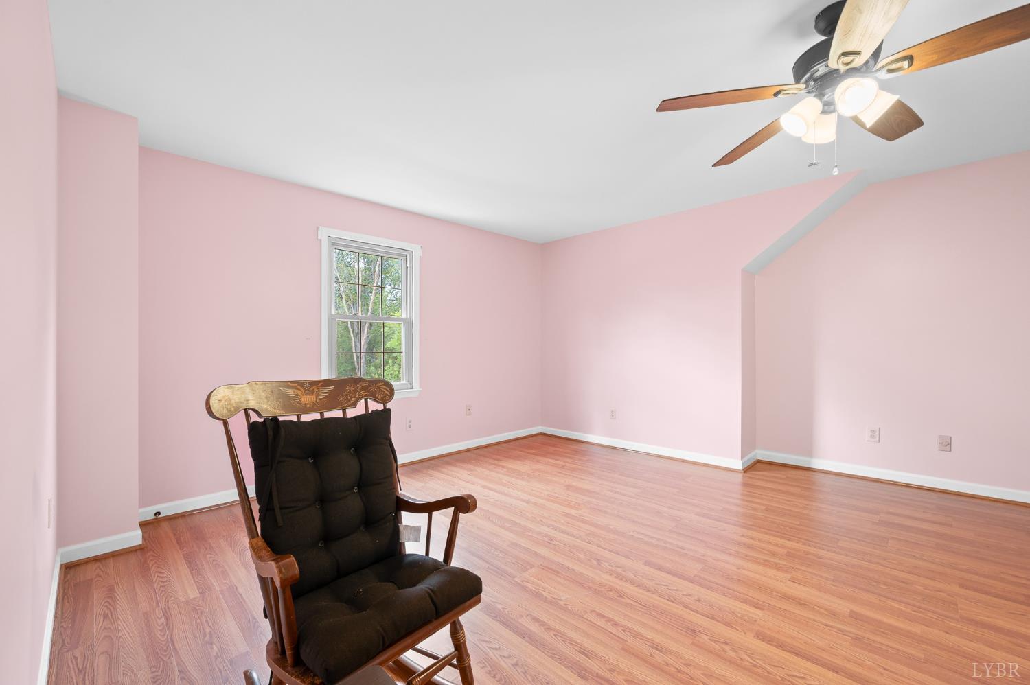111 East Otter Ridge Drive Goode, VA 24556 - Photo 31 of 62 a view of a livingroom with wooden floor and a ceiling fan