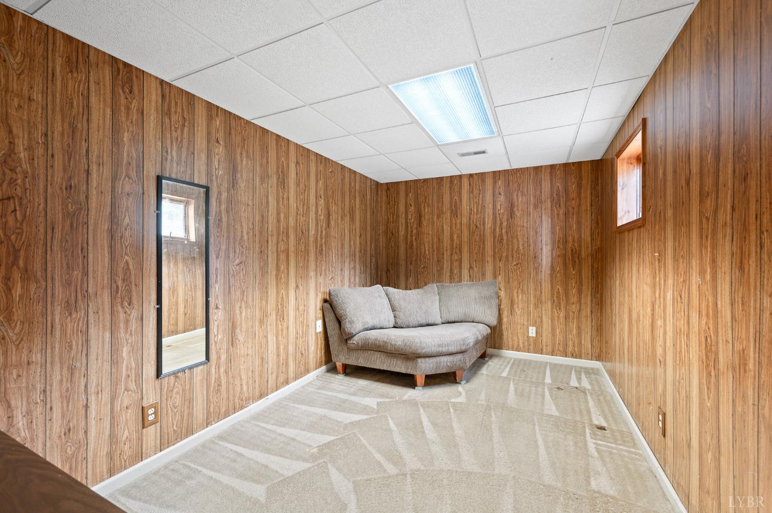 111 East Otter Ridge Drive Goode, VA 24556 - Photo 37 of 62 a bedroom with a bed and a couch