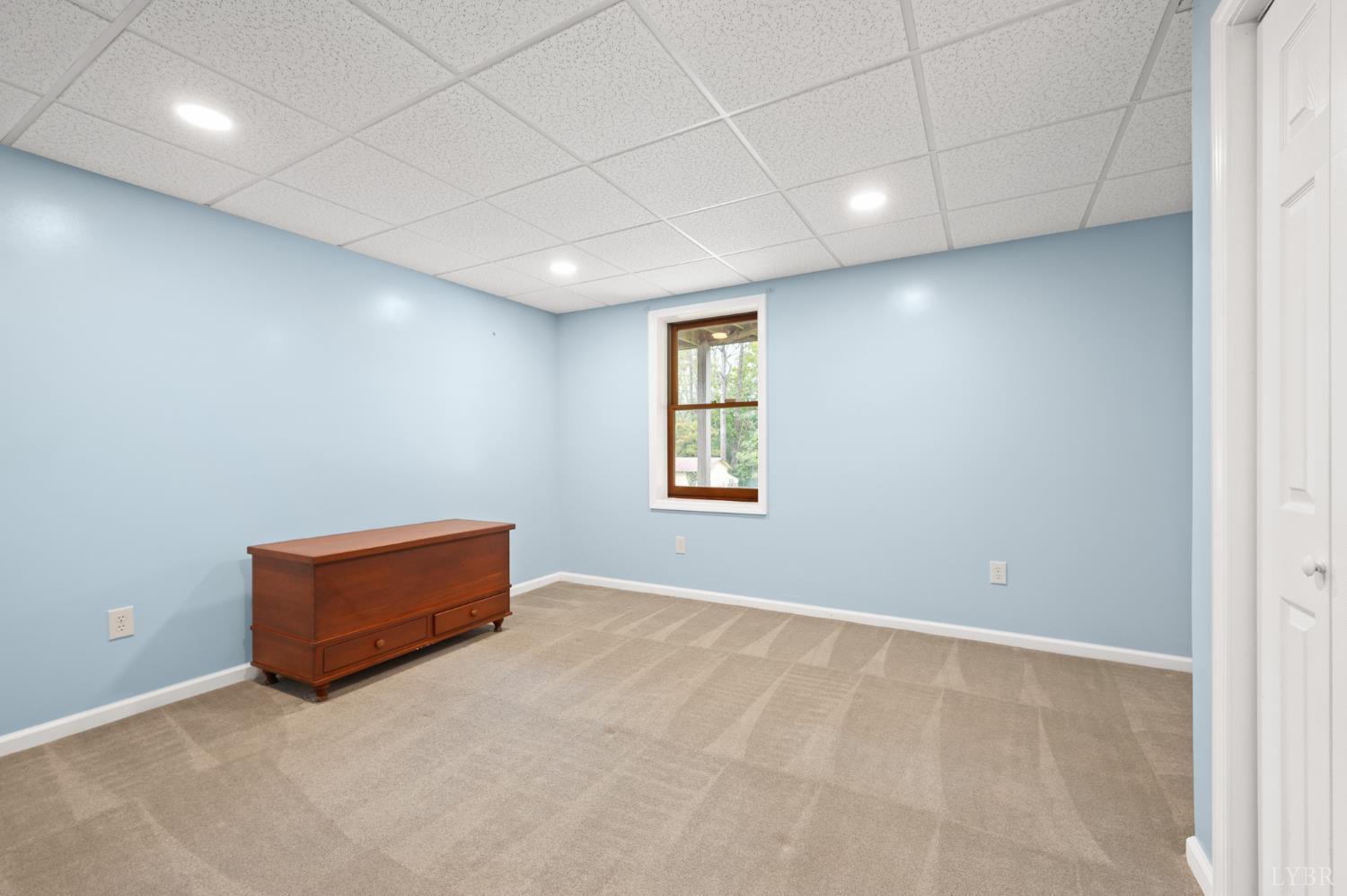 111 East Otter Ridge Drive Goode, VA 24556 - Photo 41 of 62 an empty room with windows