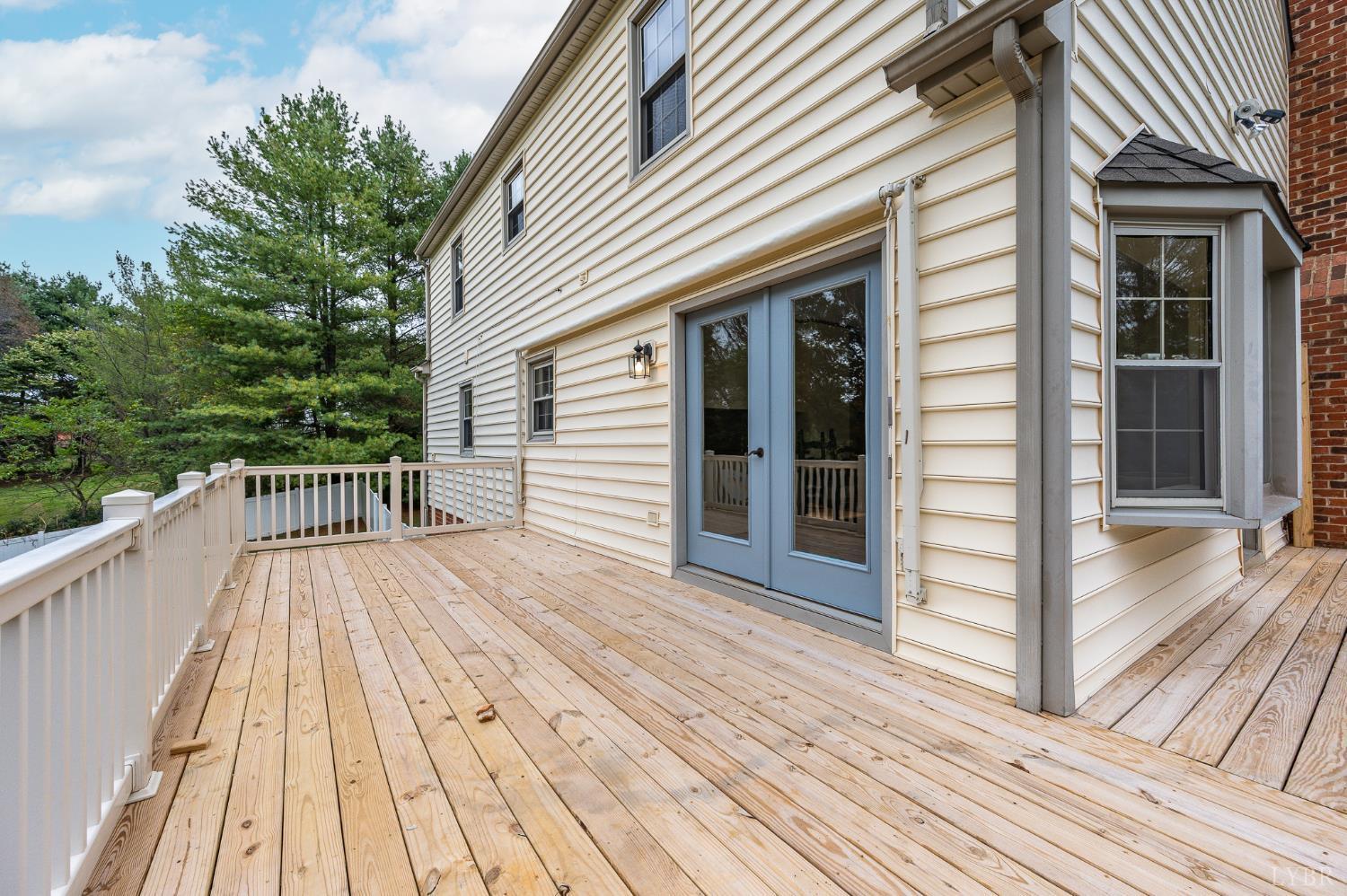 111 East Otter Ridge Drive Goode, VA 24556 - Photo 45 of 62 a view of a house with a deck