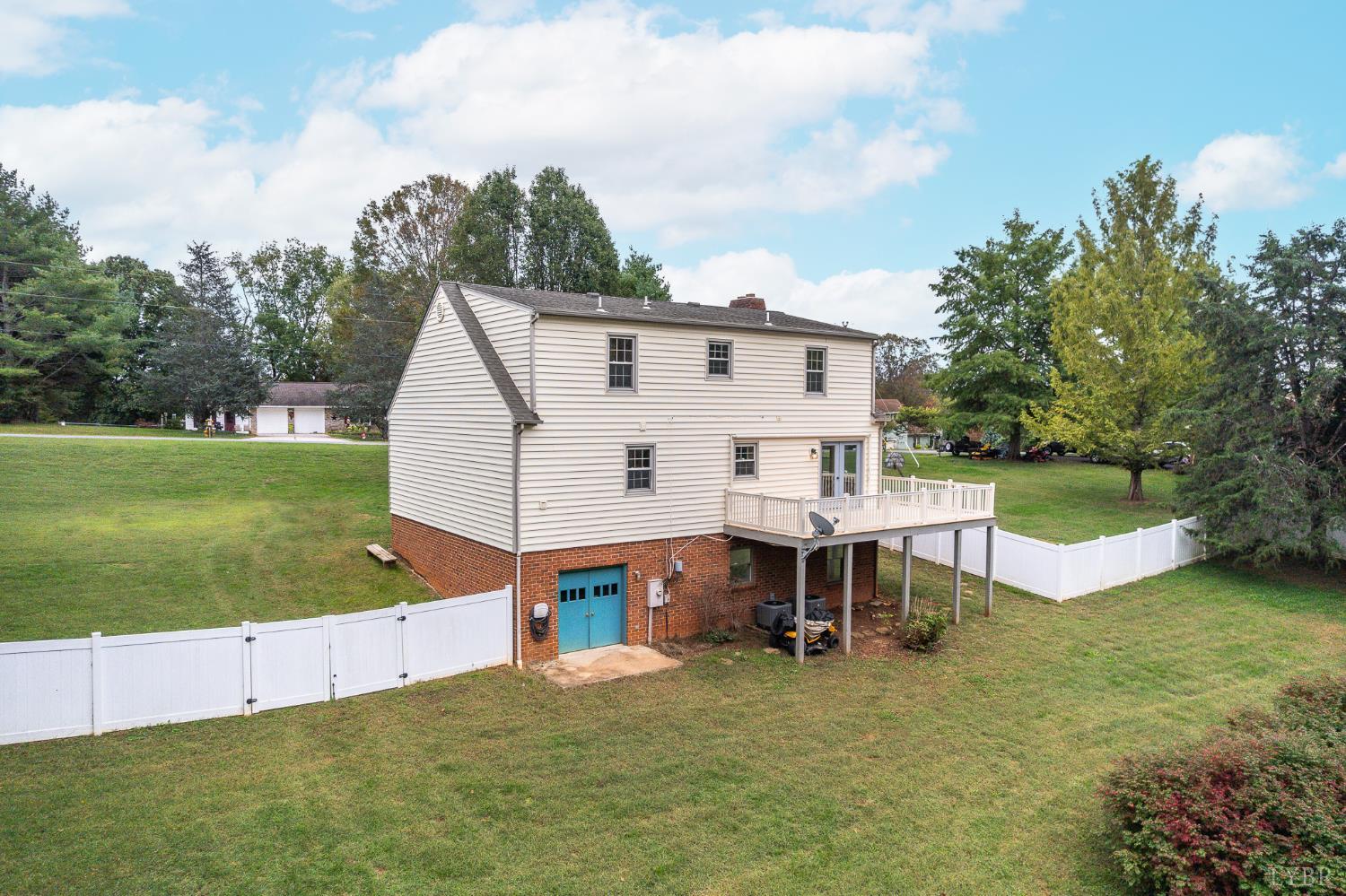 111 East Otter Ridge Drive Goode, VA 24556 - Photo 48 of 62 a view of a house with a yard and sitting area