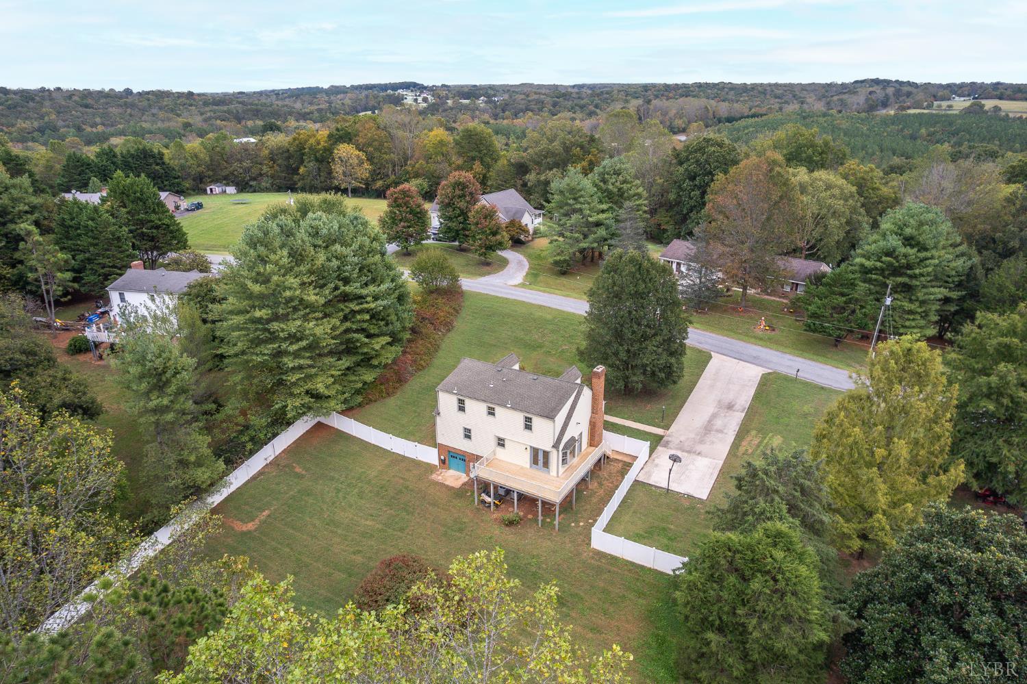 111 East Otter Ridge Drive Goode, VA 24556 - Photo 51 of 62 an aerial view of a house with a lake view