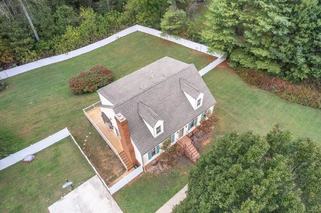 an aerial view of residential house with outdoor space