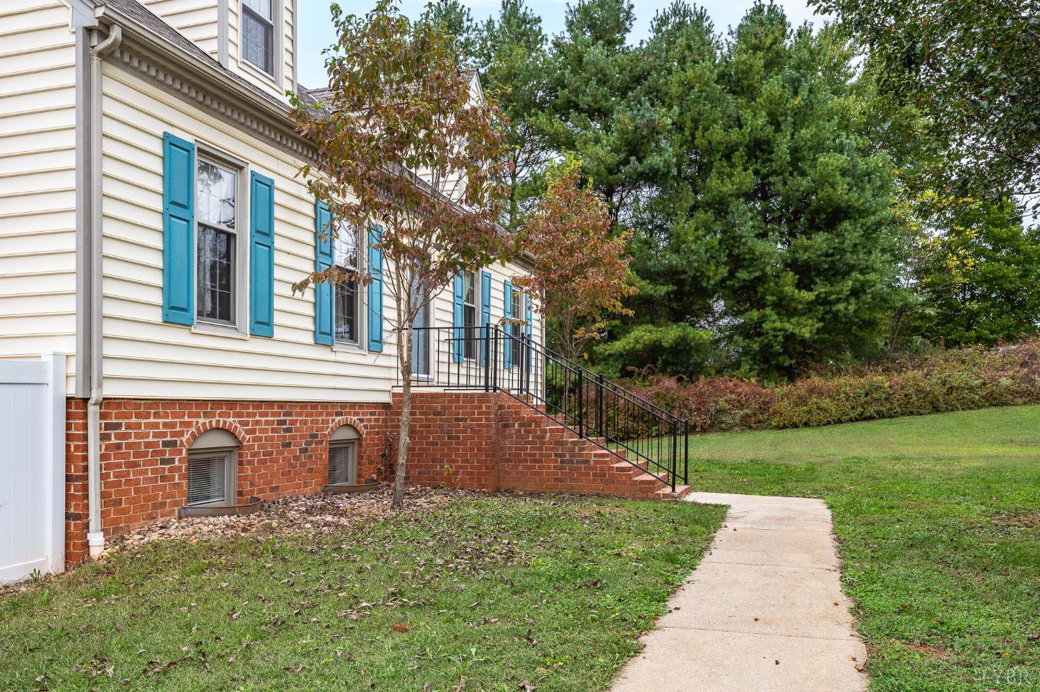 111 East Otter Ridge Drive Goode, VA 24556 - Photo 8 of 62 a view of a house with a yard