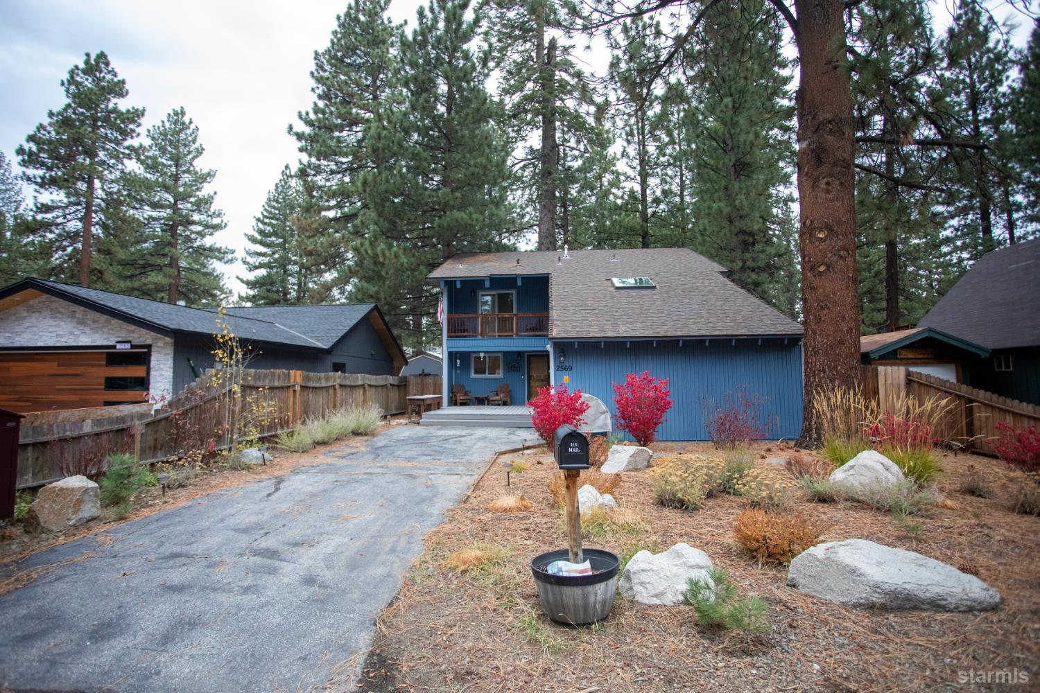 2569 Alma Avenue South Lake Tahoe, CA 96150 - Photo 35 of 35 a front view of a house with garden