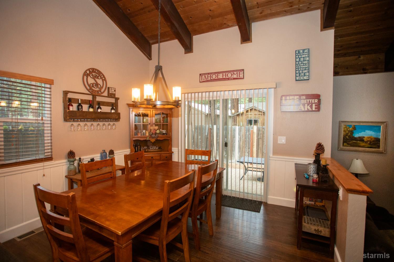 2569 Alma Avenue South Lake Tahoe, CA 96150 - Photo 9 of 35 a dining room with furniture window and wooden floor