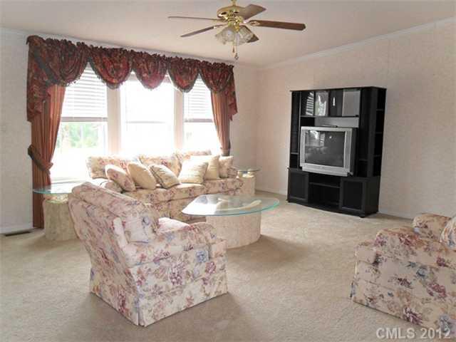 872 Tower Road Vale, NC 28168 - Photo 2 of 6 a living room with furniture and a large window