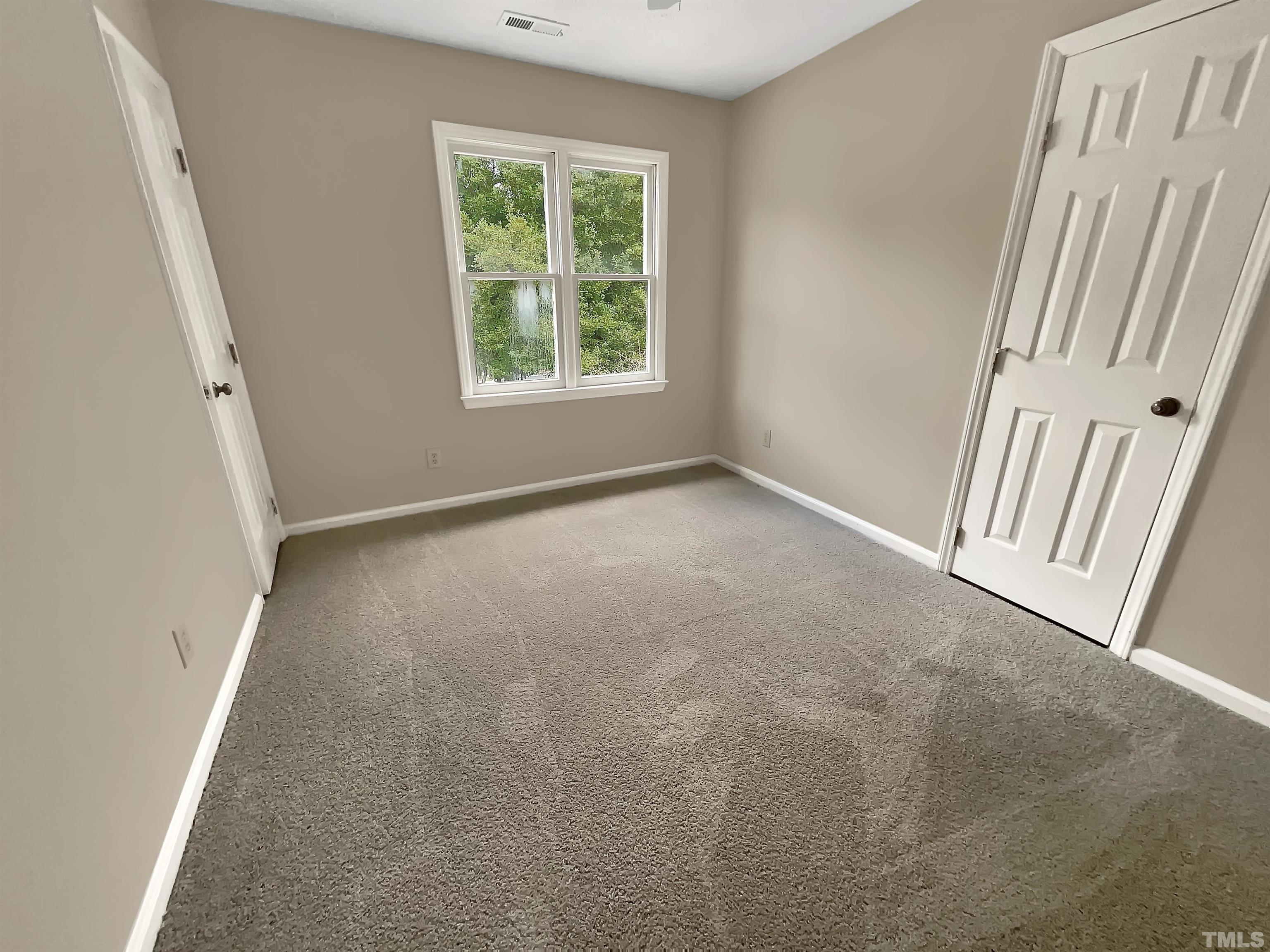 4101 Kaplan Drive Raleigh, NC 27606 - Photo 20 of 22 an empty room with windows