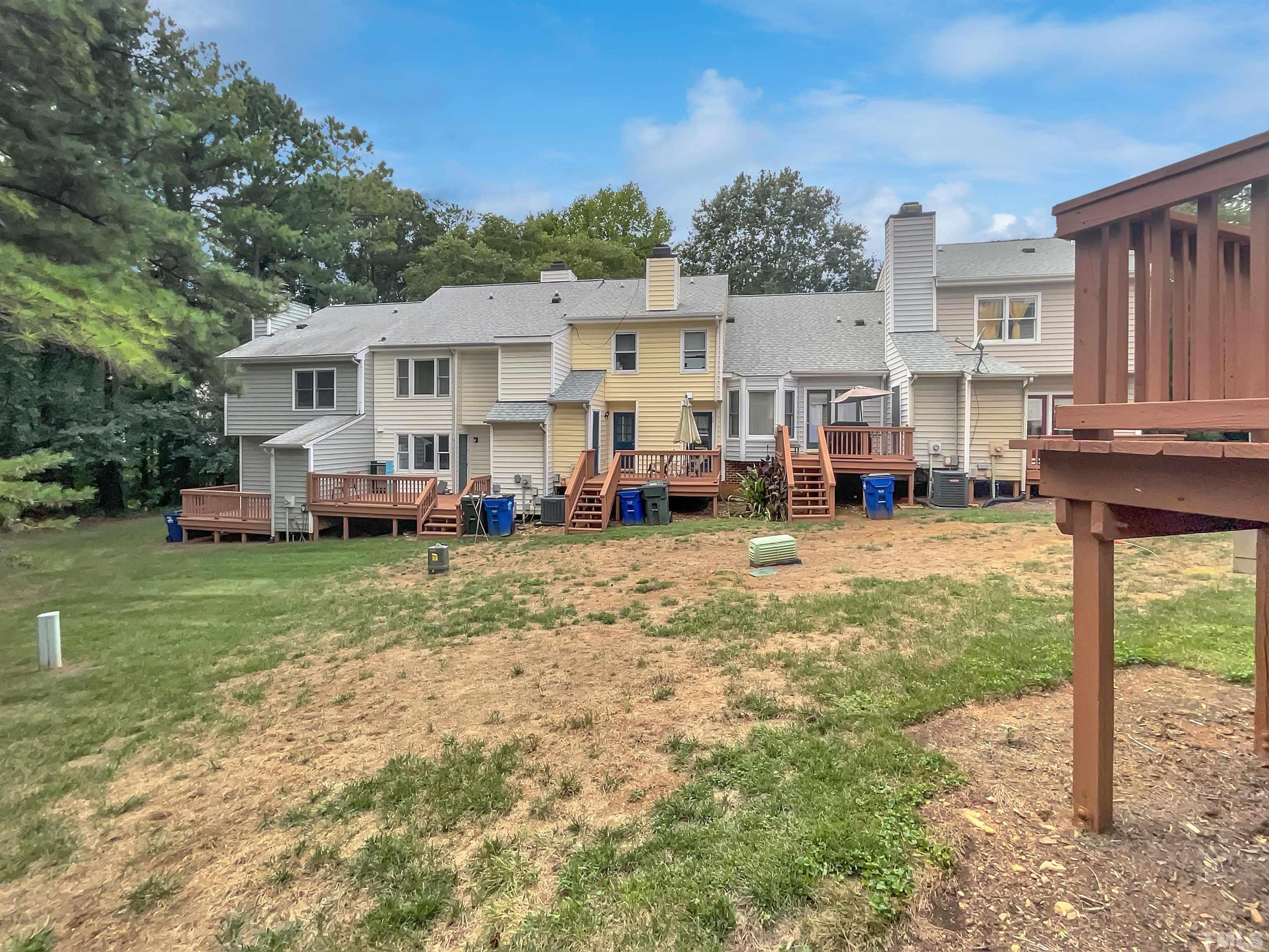 4101 Kaplan Drive Raleigh, NC 27606 - Photo 22 of 22 a view of a house with a backyard
