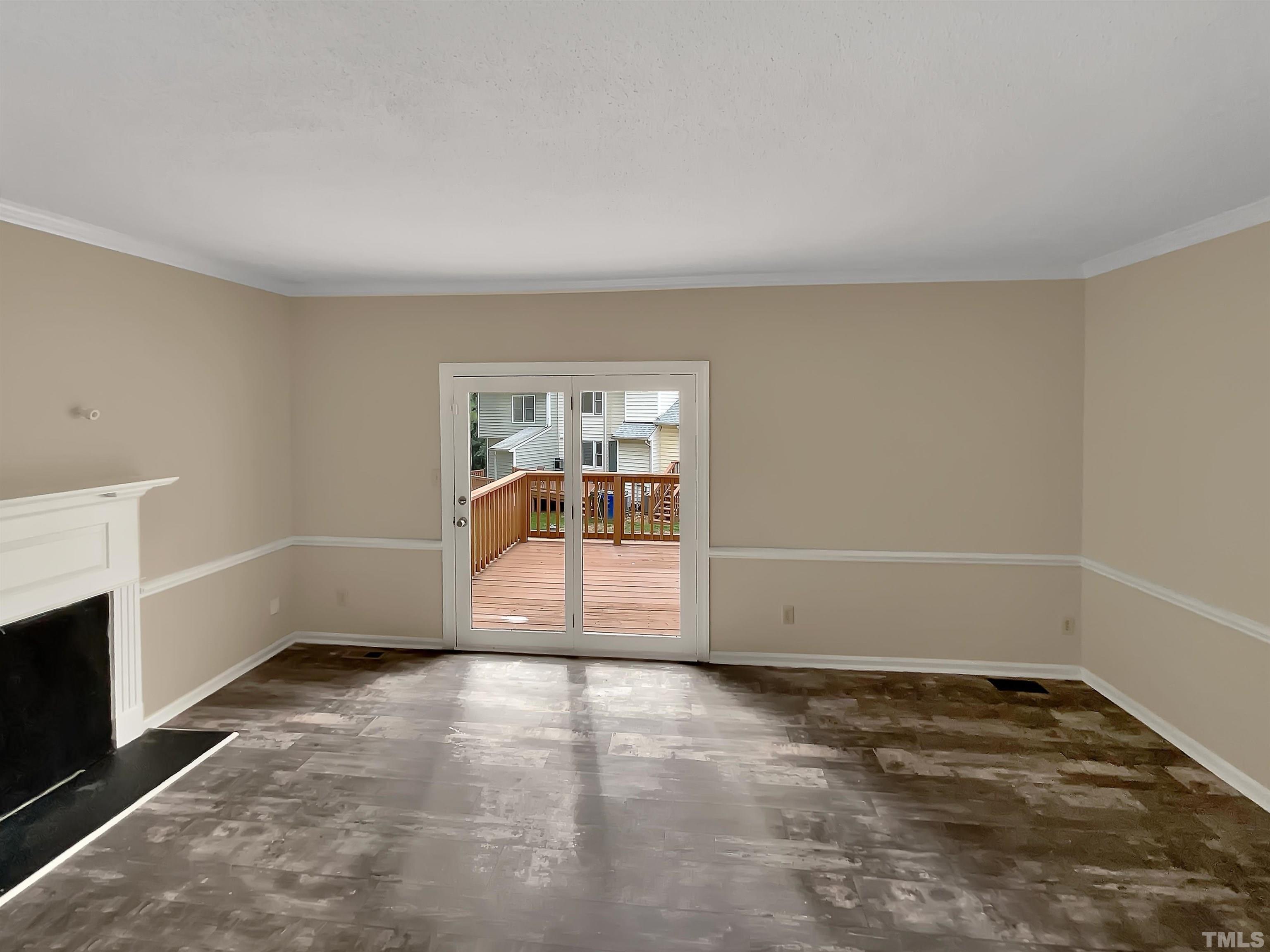 4101 Kaplan Drive Raleigh, NC 27606 - Photo 8 of 22 a view of empty room with wooden floor and fan