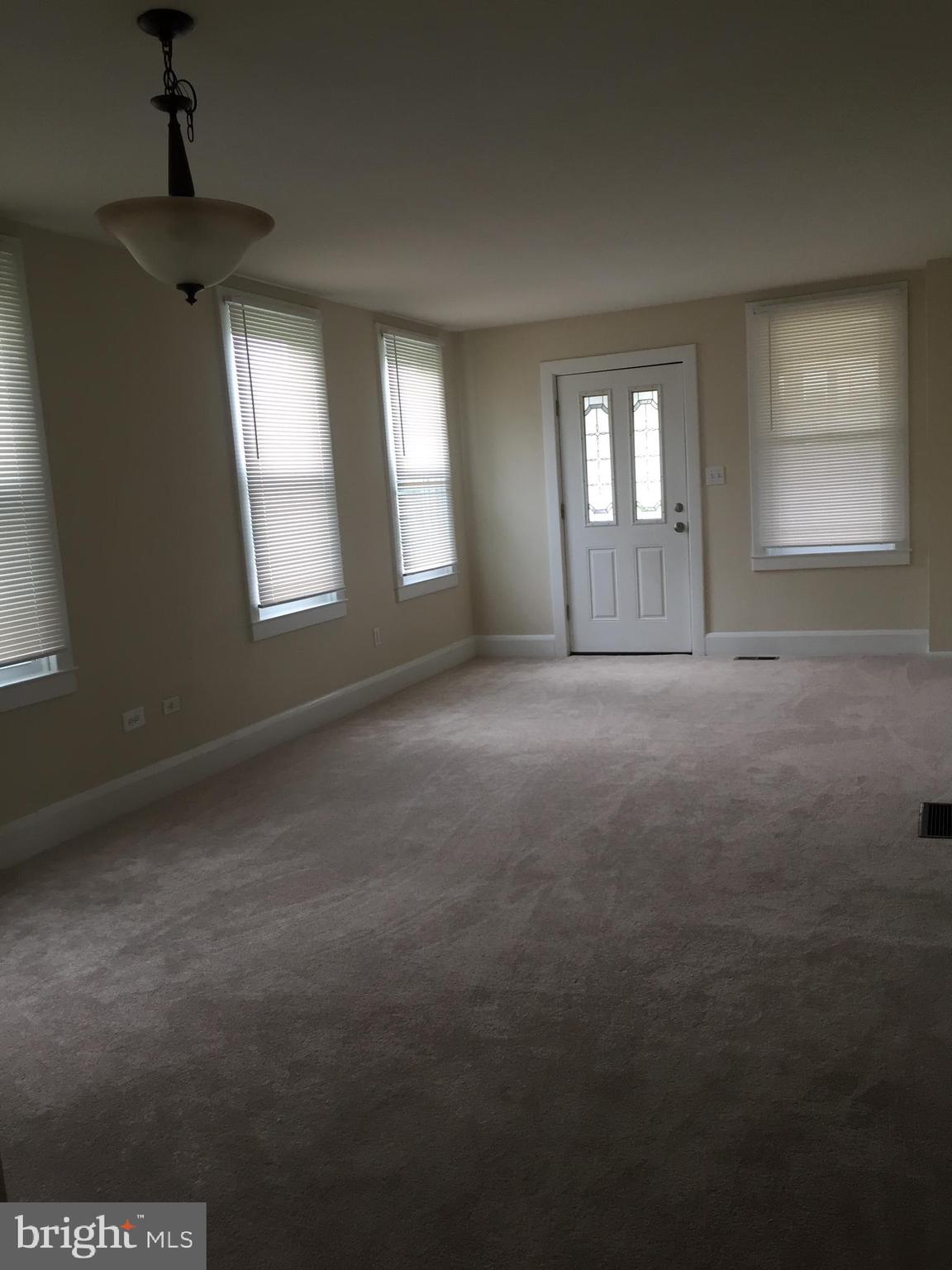 7327 Windsor Mill Road Baltimore, MD 21244 - Photo 8 of 28 Living room/dining room