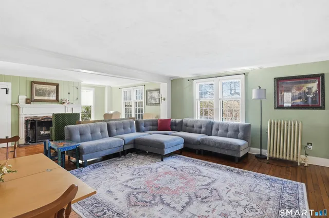 a living room with furniture and a couch