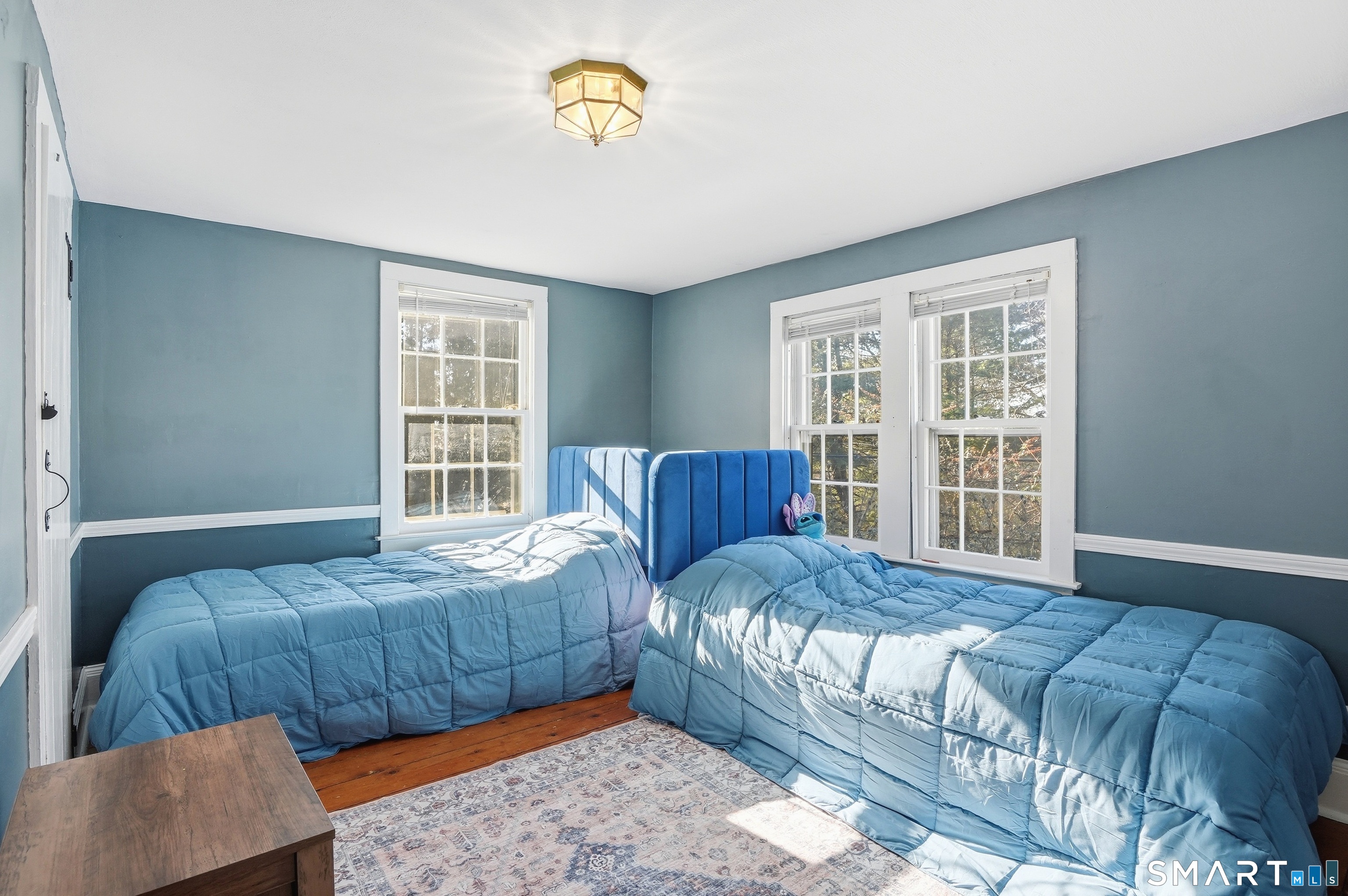 417 Washington Street Norwich, CT 06360 - Photo 22 of 40 a bedroom with a large bed and a window