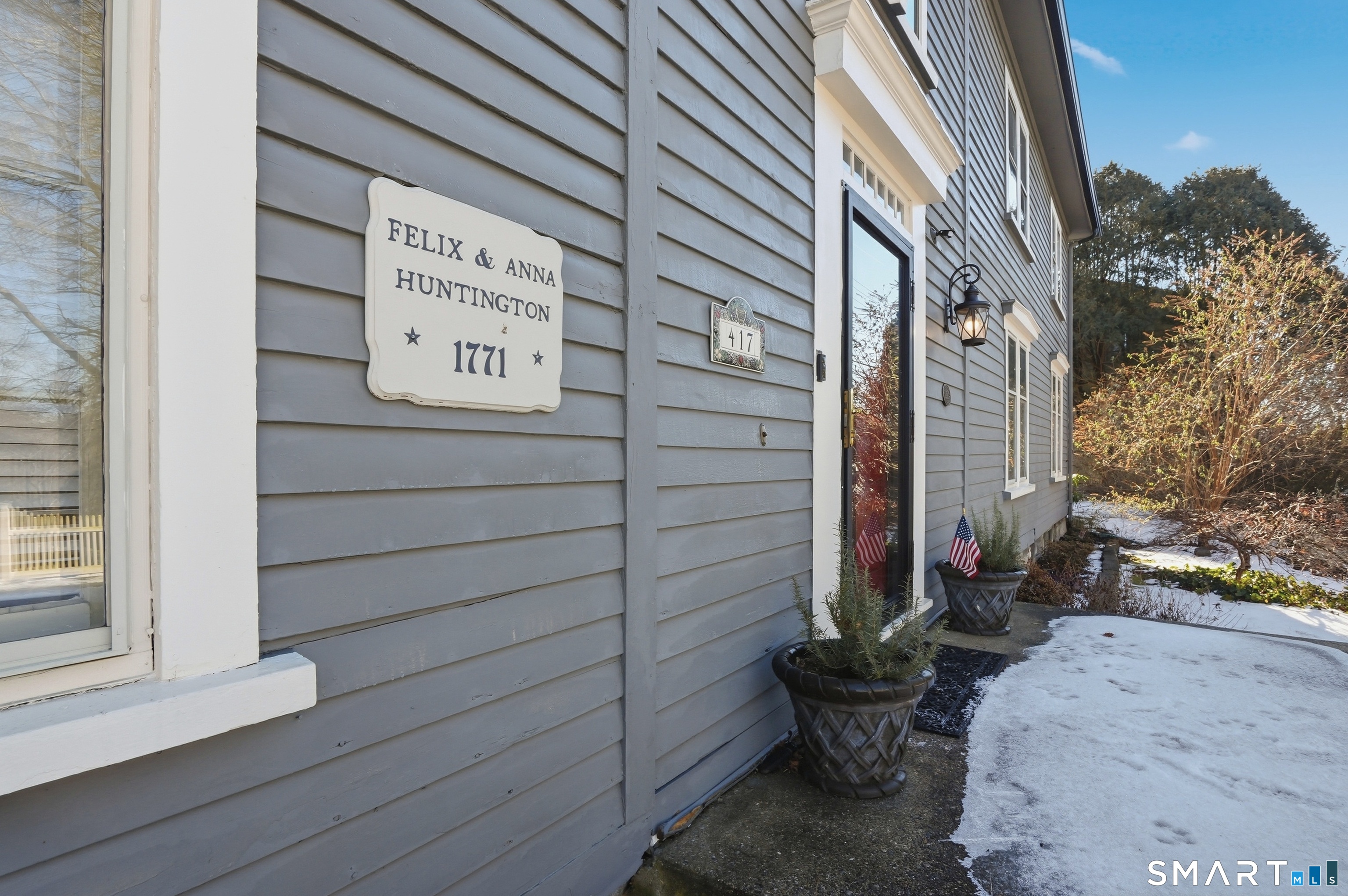 417 Washington Street Norwich, CT 06360 - Photo 3 of 40 a view of a door and chair in the balcony