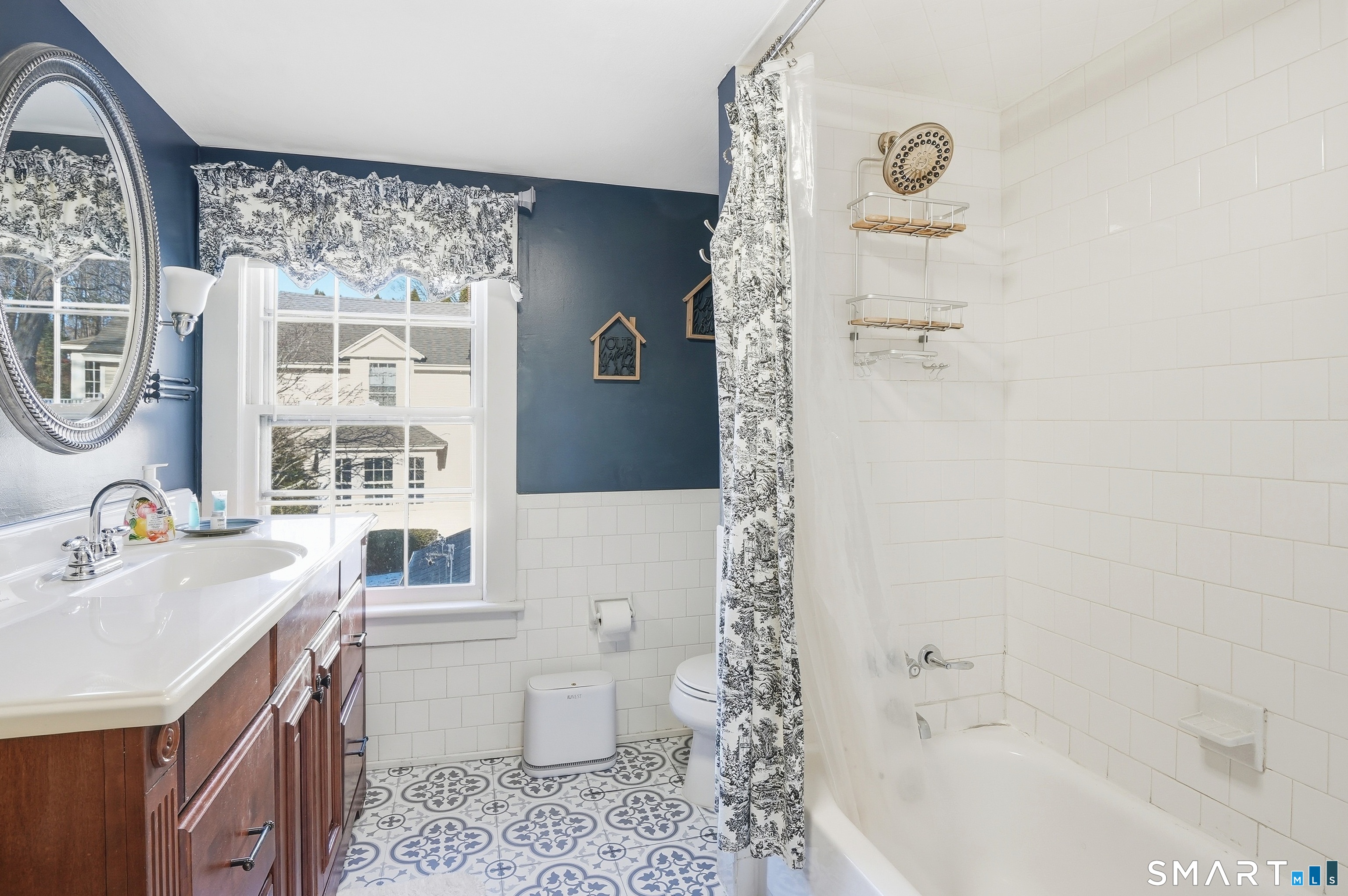 417 Washington Street Norwich, CT 06360 - Photo 31 of 40 a bathroom with a sink toilet and shower