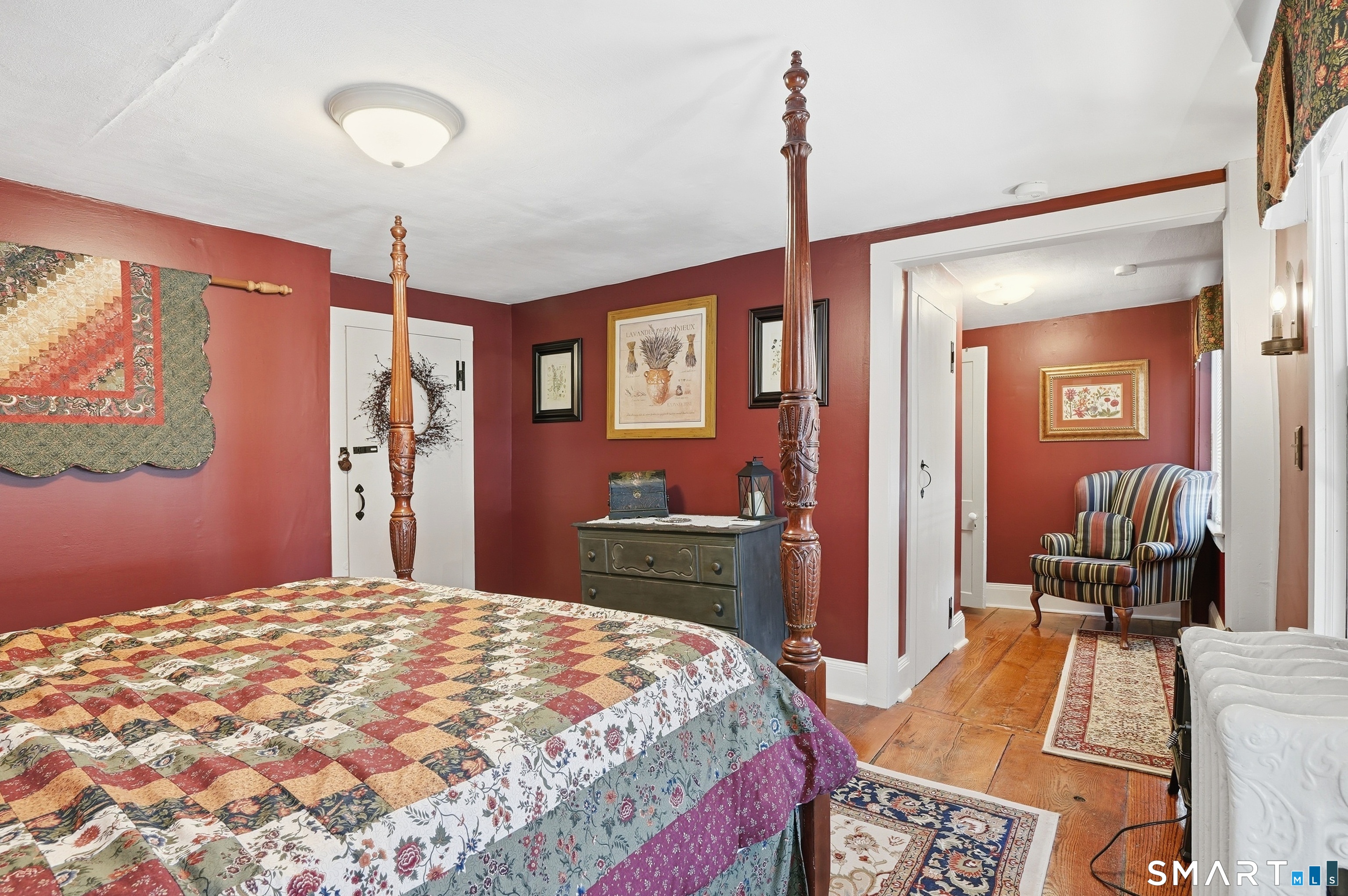 417 Washington Street Norwich, CT 06360 - Photo 36 of 40 a bedroom with a bed and a dresser