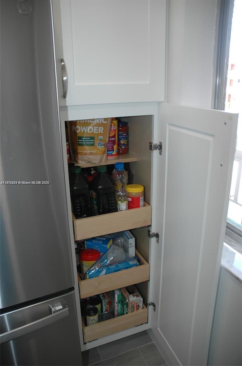 3571 Inverrary Drive, Unit 201 Lauderhill, FL 33319 - Photo 11 of 48 a room with storage and utility