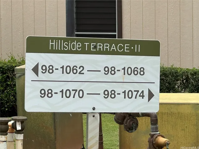 a sign that is on the wall of building