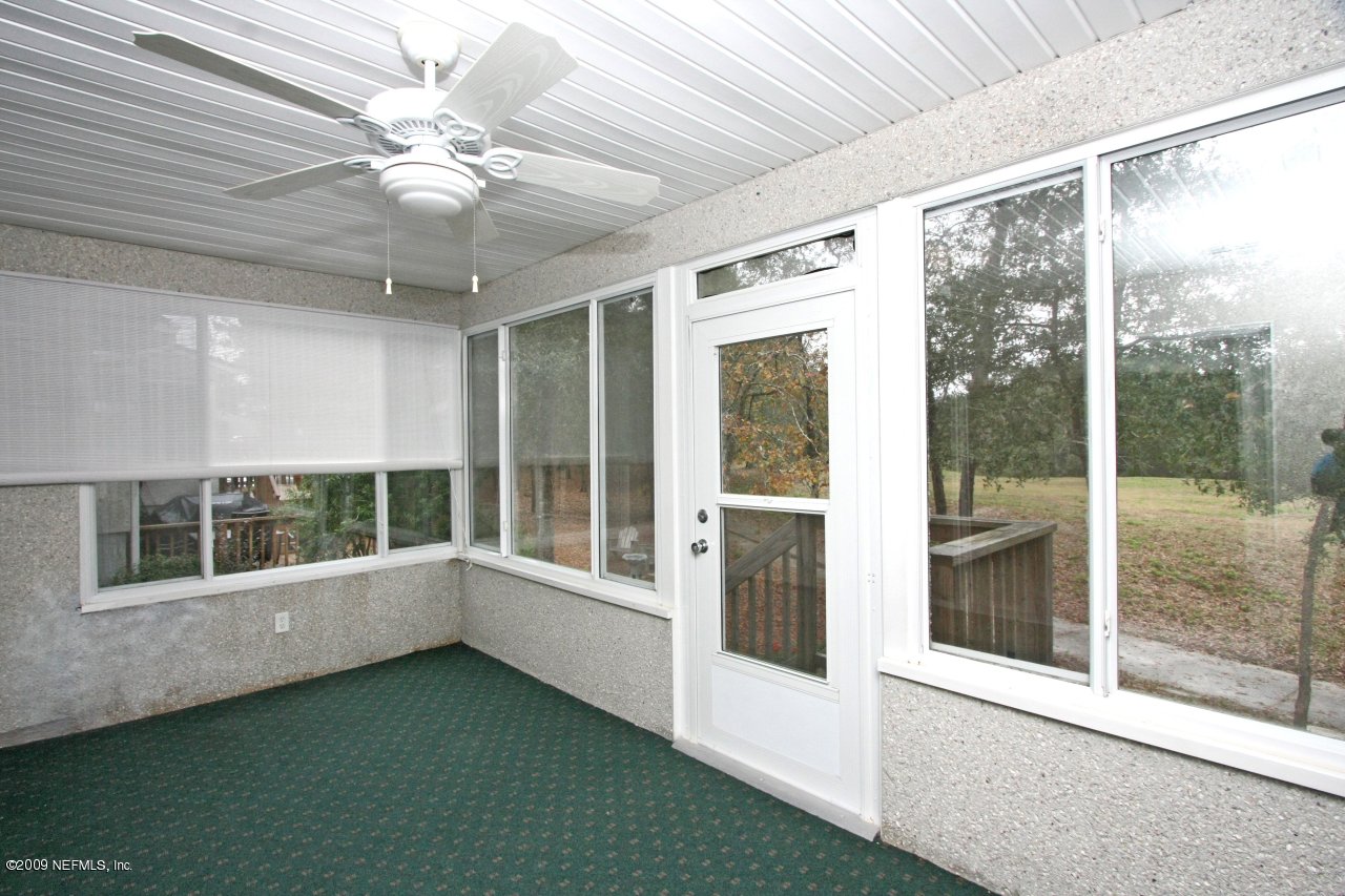 3109 Ravines Road Middleburg, FL 32068 - Photo 4 of 14 a view of an empty room with a window