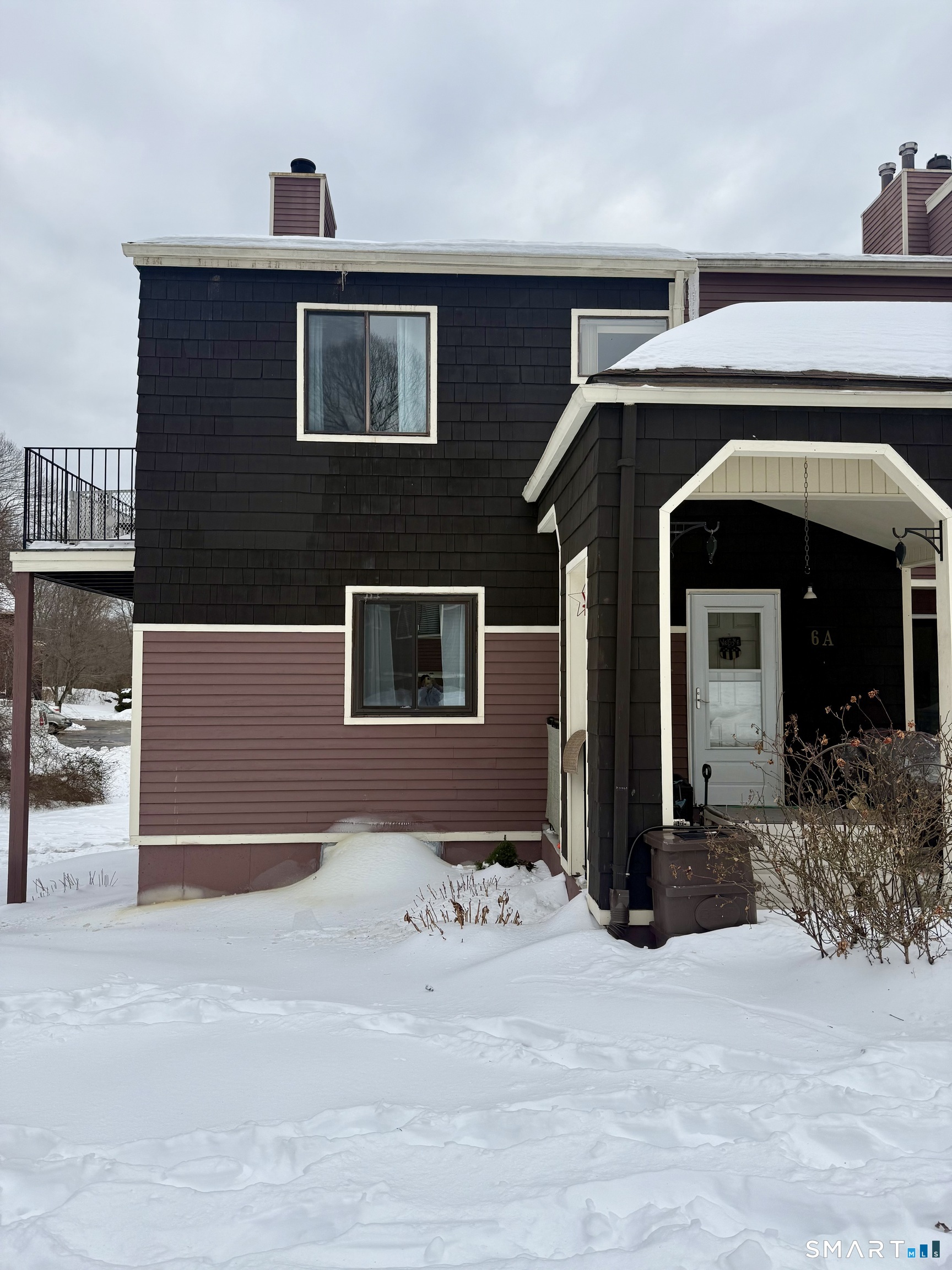 a front view of a house with yard