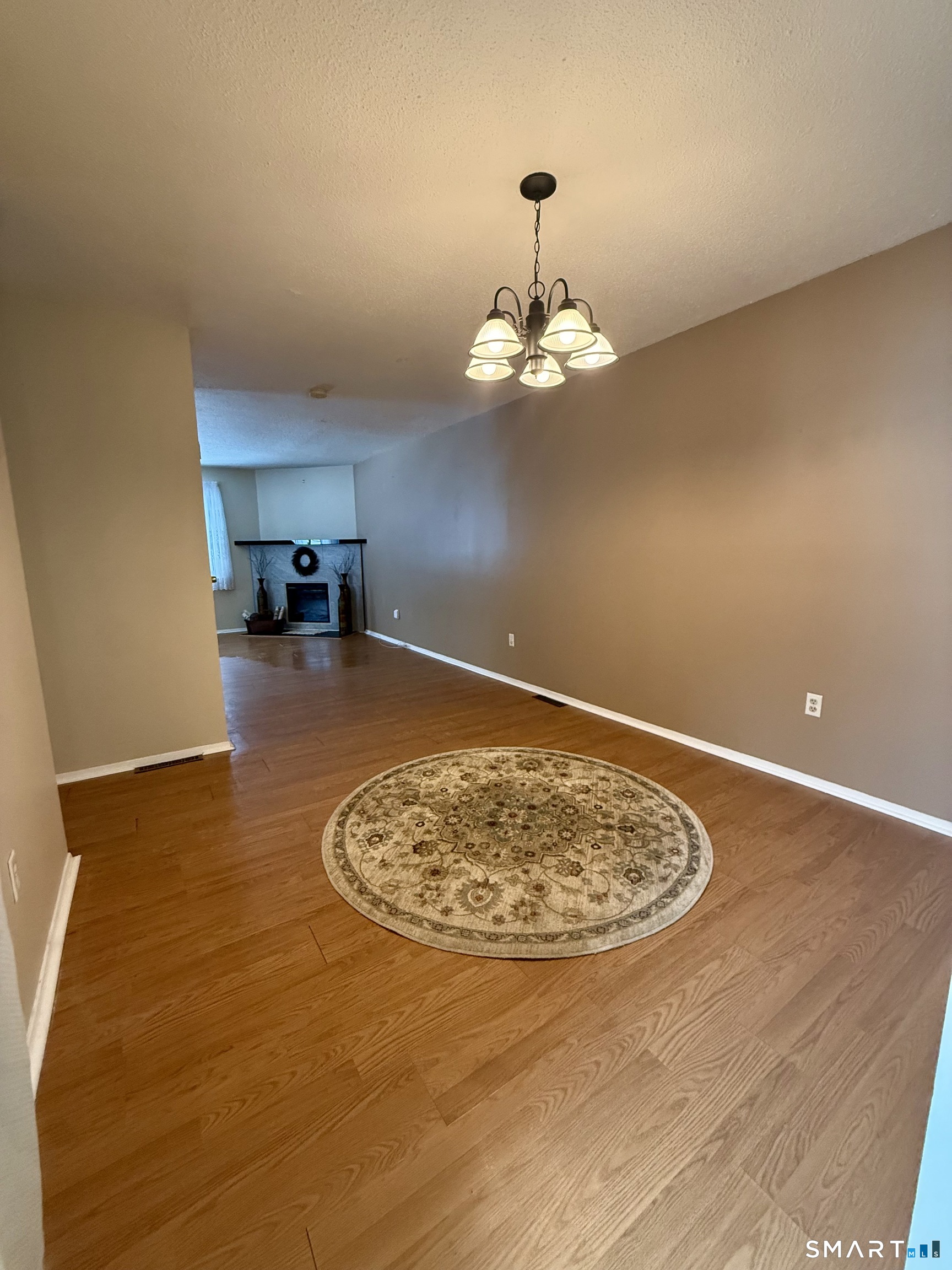 6 Stonegate Circle, Unit A Branford, CT 06405 - Photo 9 of 19 a view of a livingroom with wooden floor