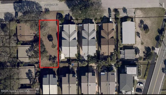 a view of a buildings with wooden stairs