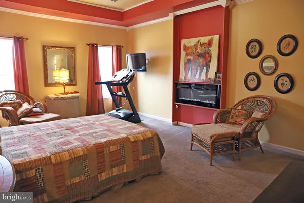 a bathroom with a shower and a sink