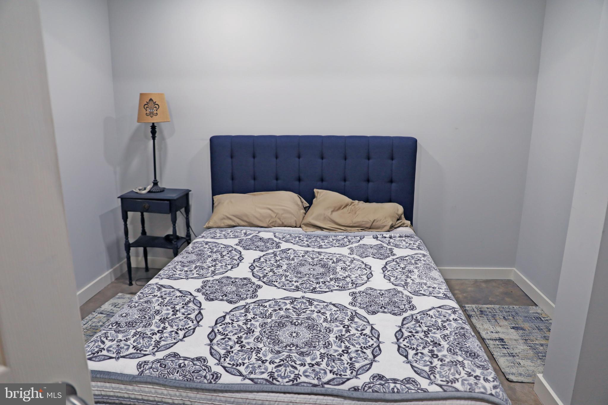 101 Trout River Terrace Falling Waters, WV 25419 - Photo 37 of 57 a bedroom with a bed and dresser