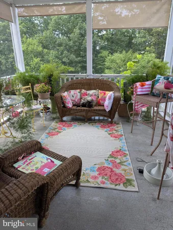a view of a house with backyard and windows