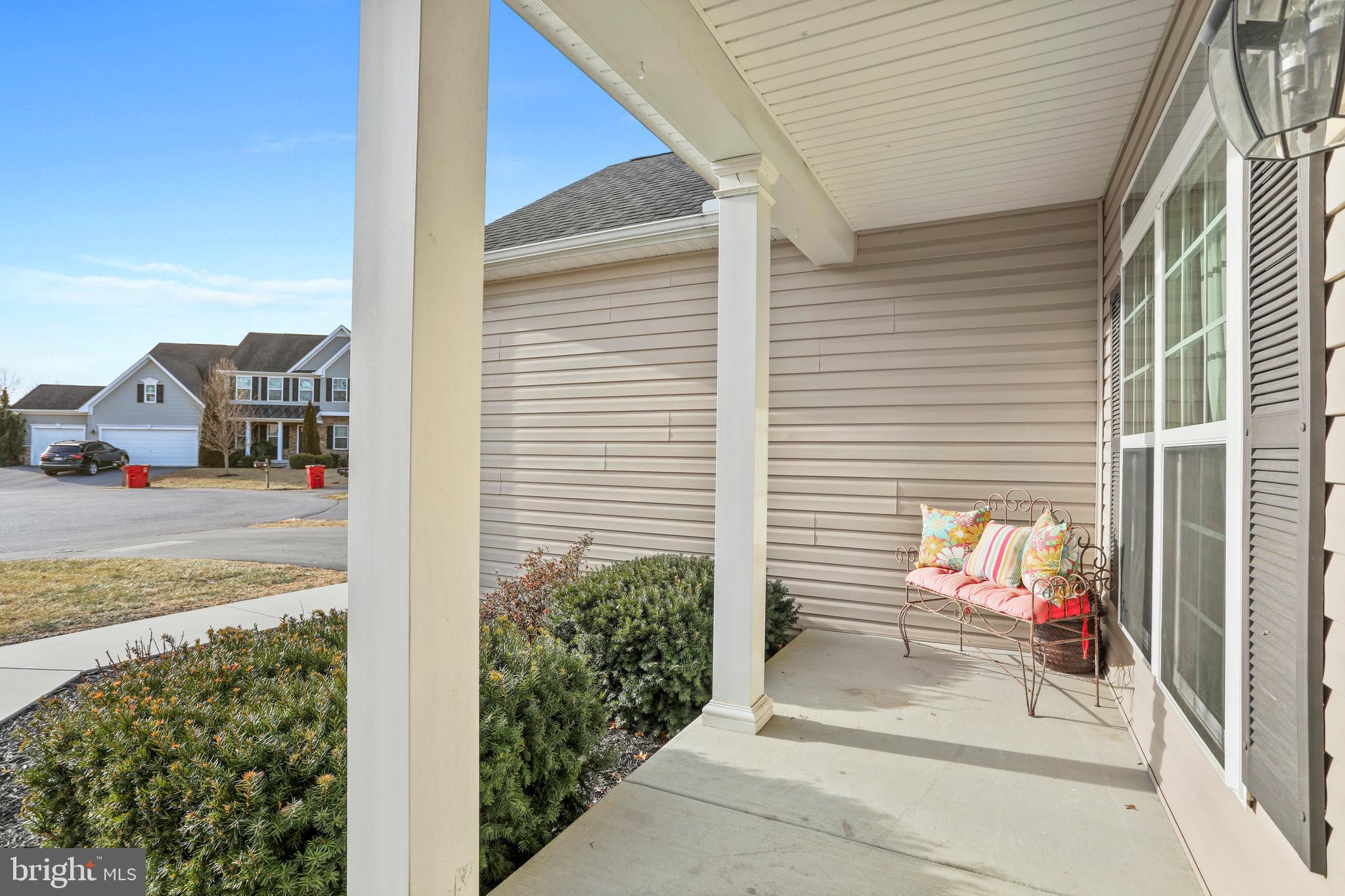 101 Trout River Terrace Falling Waters, WV 25419 - Photo 49 of 57 a view of a door of the house with a bench