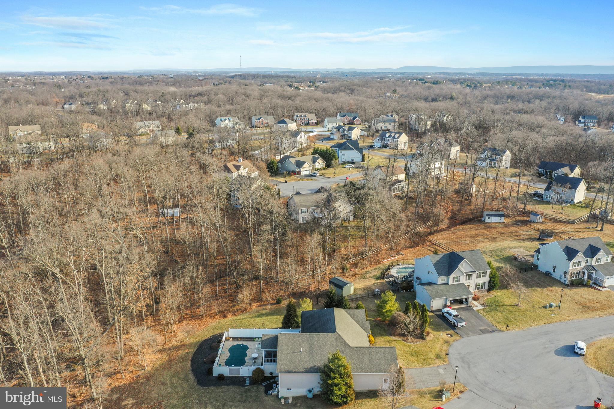 101 Trout River Terrace Falling Waters, WV 25419 - Photo 57 of 57 an aerial view of residential houses with outdoor space