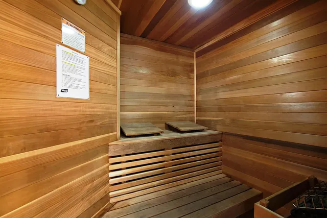 a view of a balcony with door and wooden floor