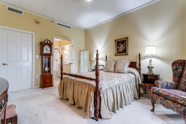 a bed room with a bed and a couch