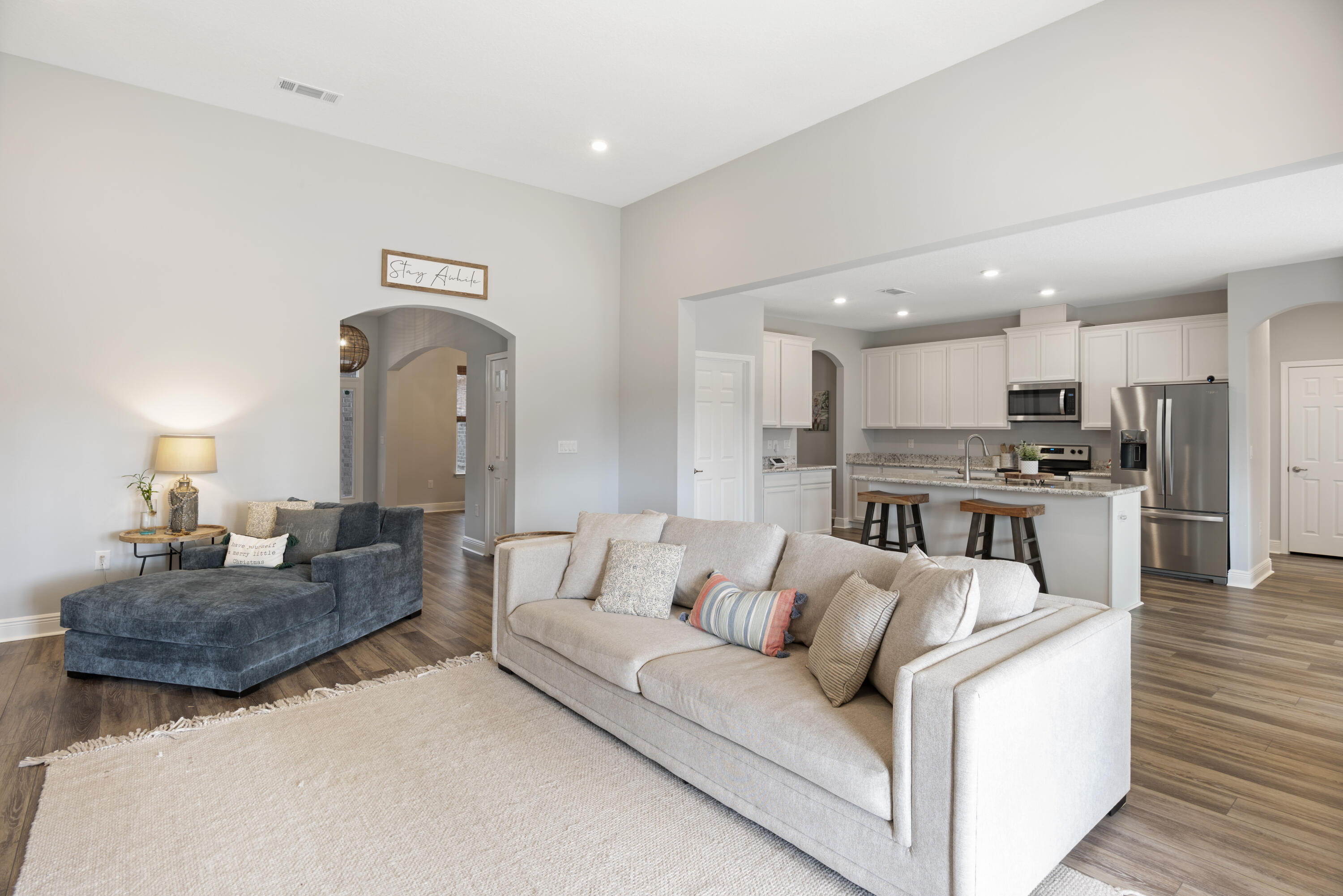 32 Brushed Dune Circle Freeport, FL 32439 - Photo 12 of 34 a living room with furniture and kitchen view