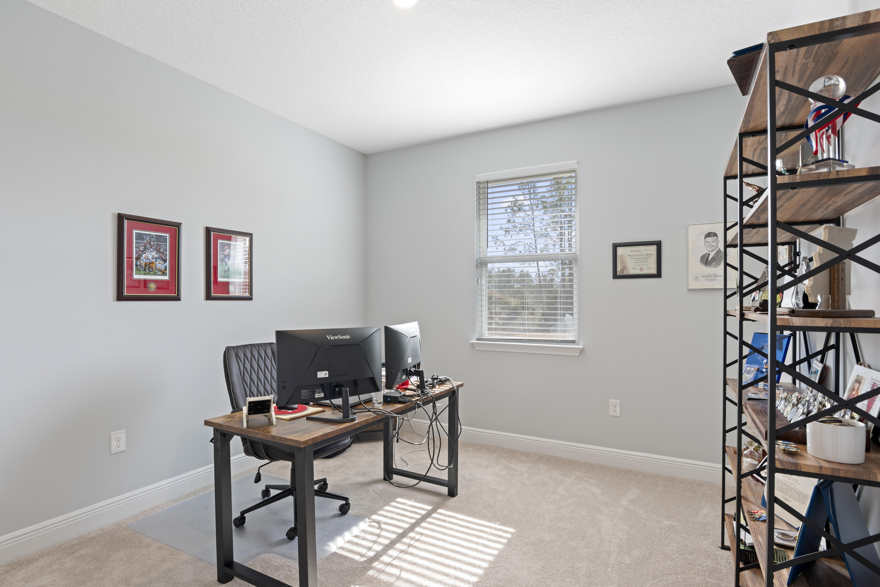 32 Brushed Dune Circle Freeport, FL 32439 - Photo 21 of 34 a workspace with furniture and a window