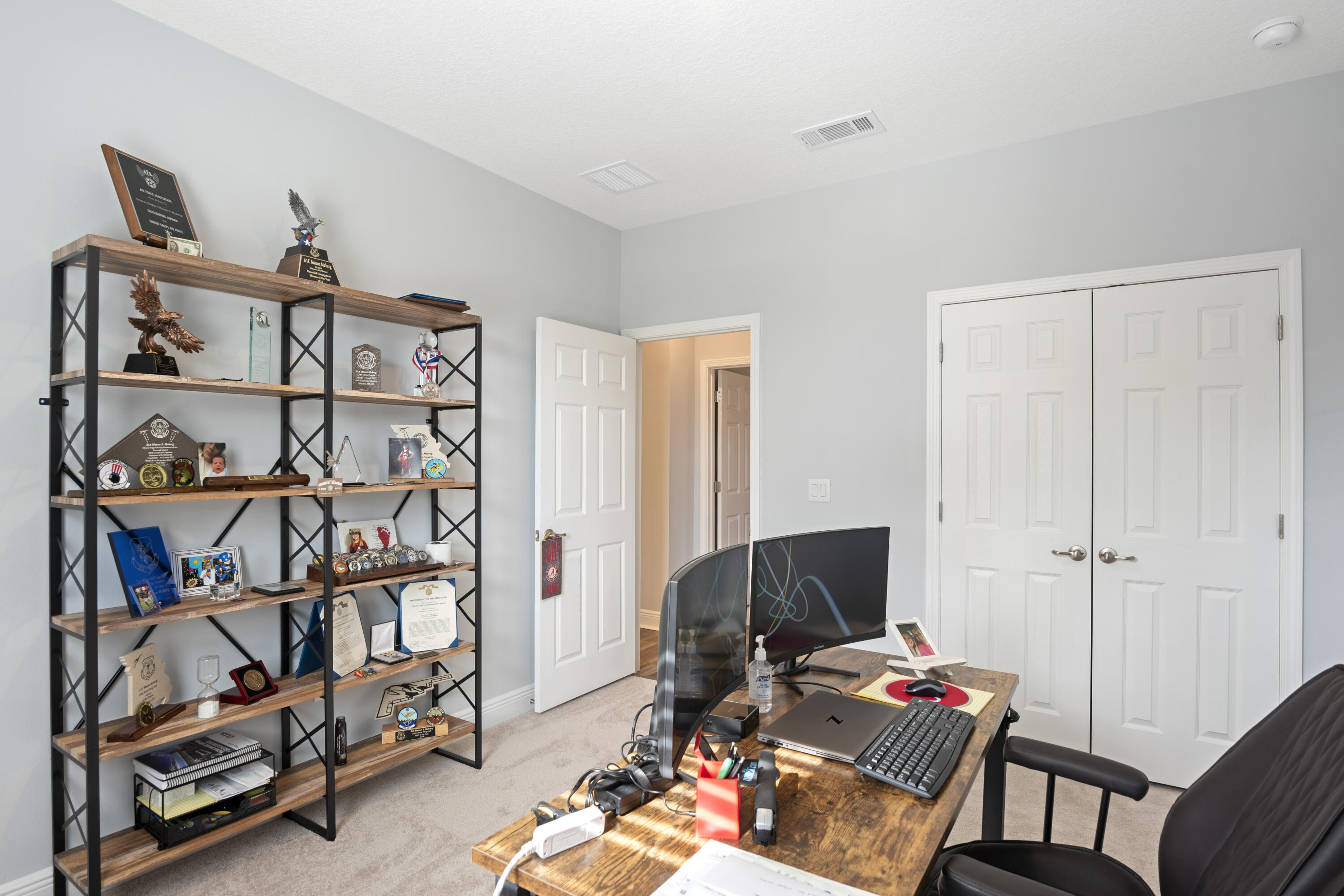 32 Brushed Dune Circle Freeport, FL 32439 - Photo 22 of 34 a bedroom with a workspace