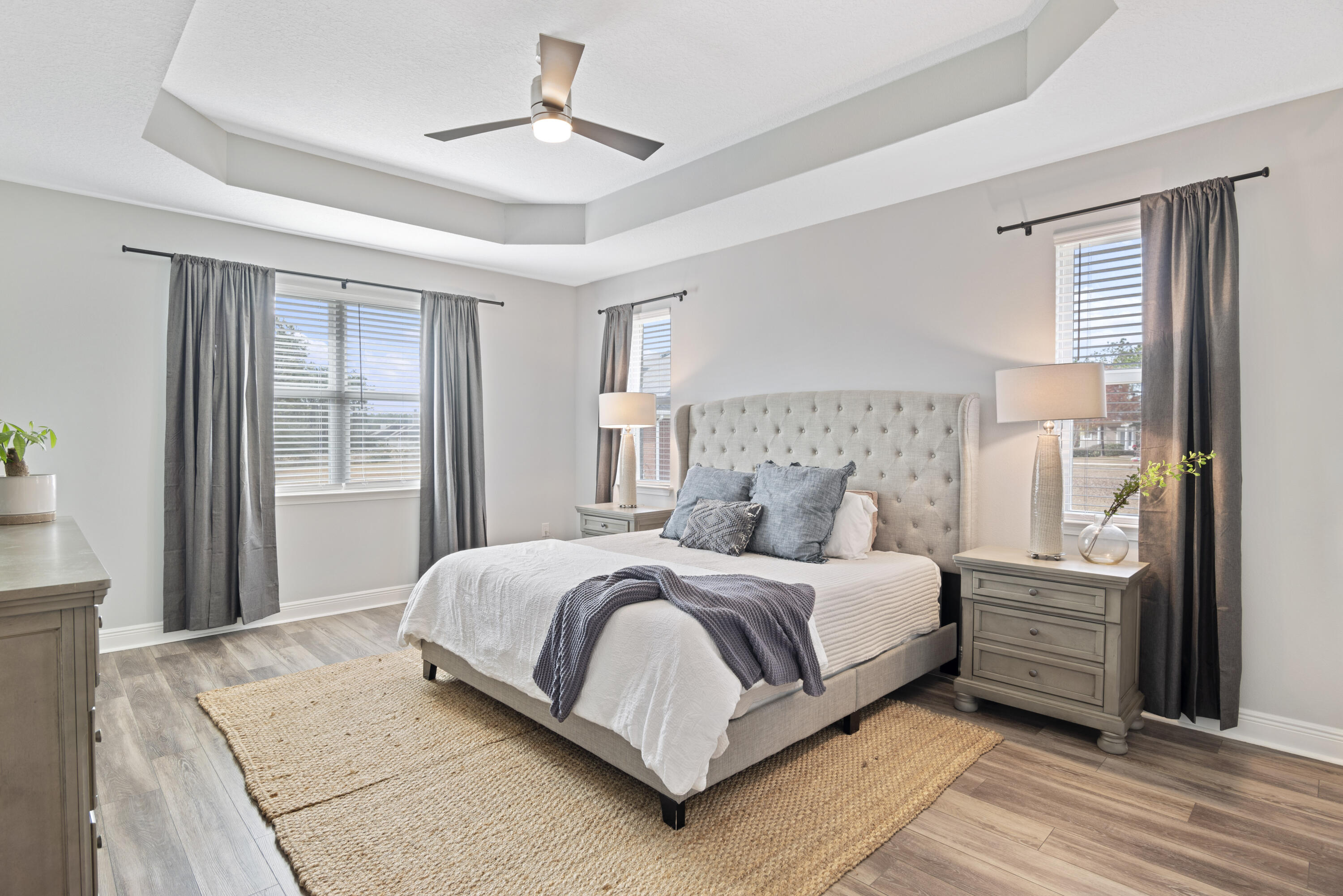 32 Brushed Dune Circle Freeport, FL 32439 - Photo 27 of 34 a bedroom with a large bed and a window