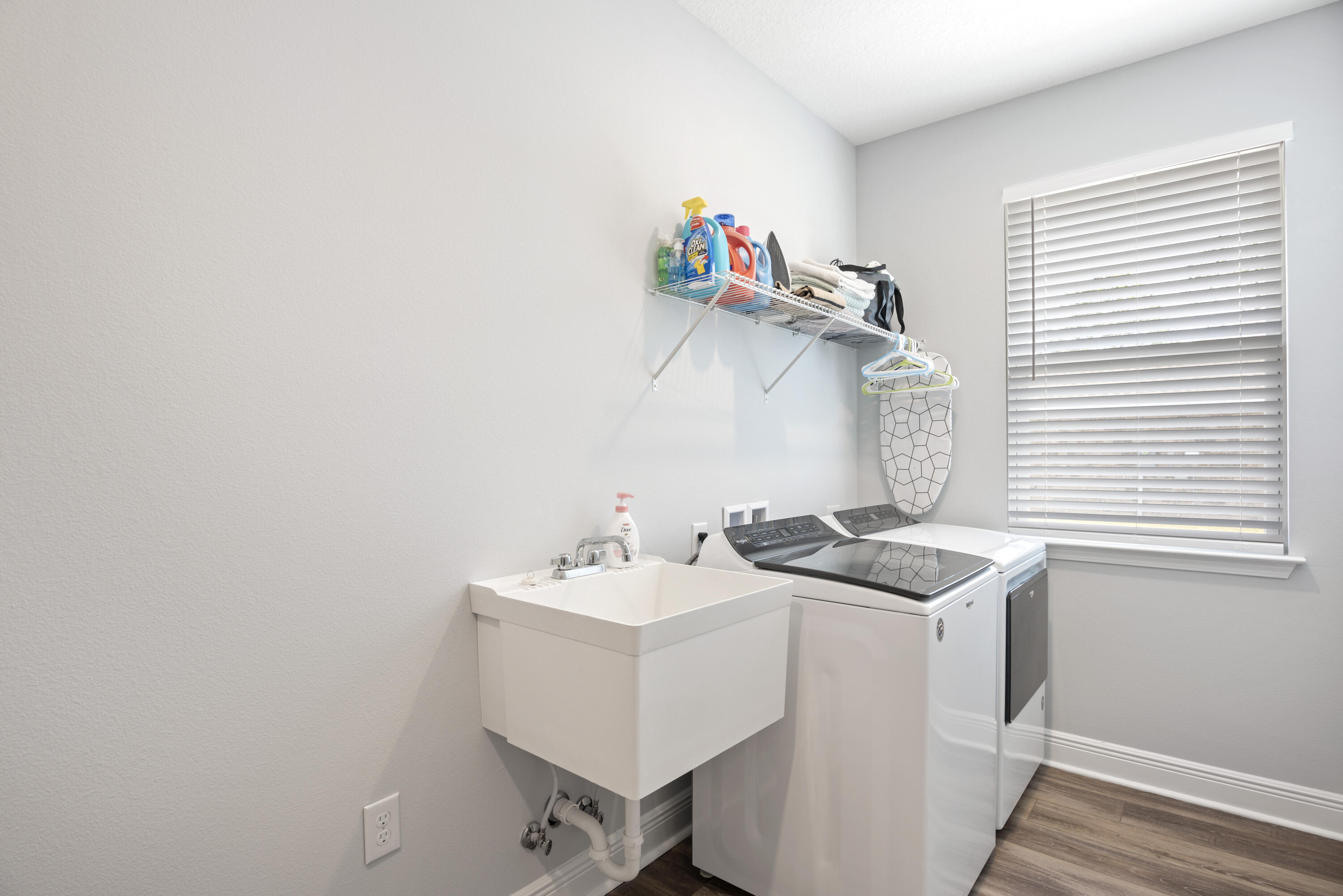 32 Brushed Dune Circle Freeport, FL 32439 - Photo 31 of 34 a bathroom with a sink and a window