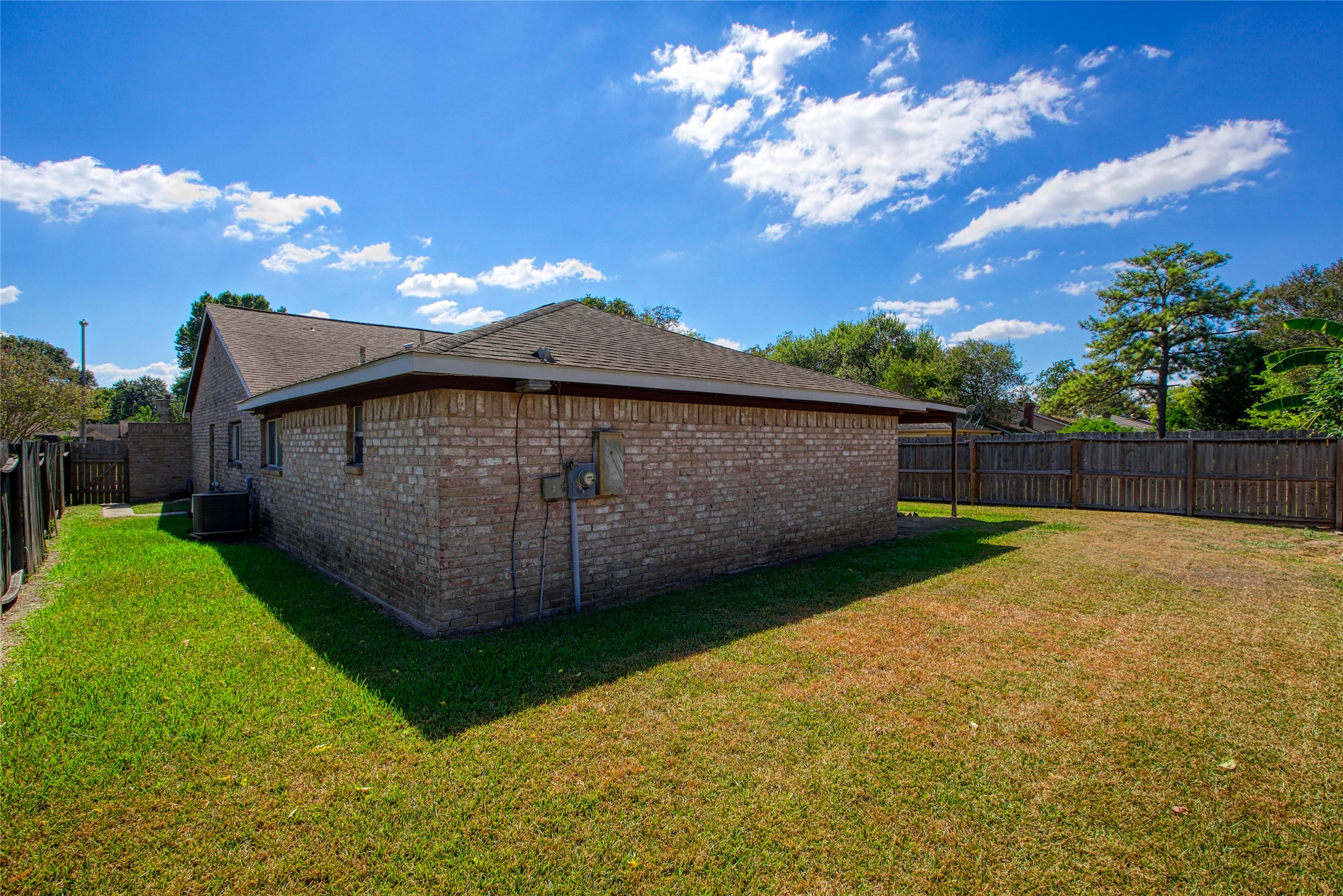 6630 Brownie Campbell Road Houston, TX 77086 - Photo 26 of 28 a view of a backyard with a trampoline