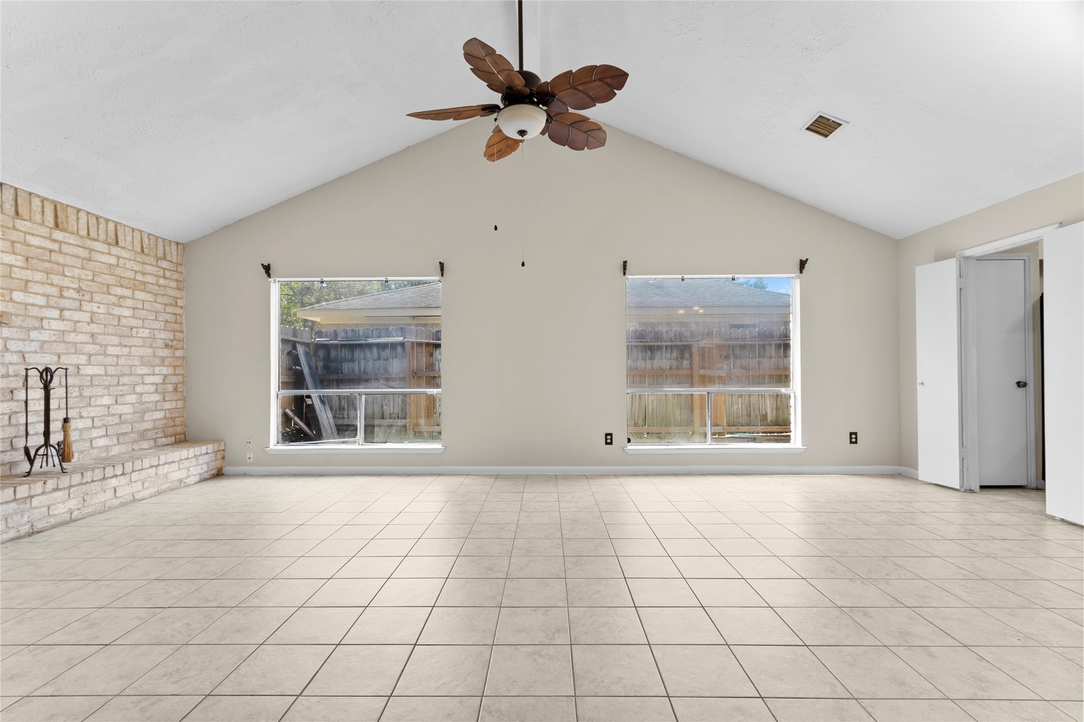 6630 Brownie Campbell Road Houston, TX 77086 - Photo 3 of 28 a view of an empty room with a window